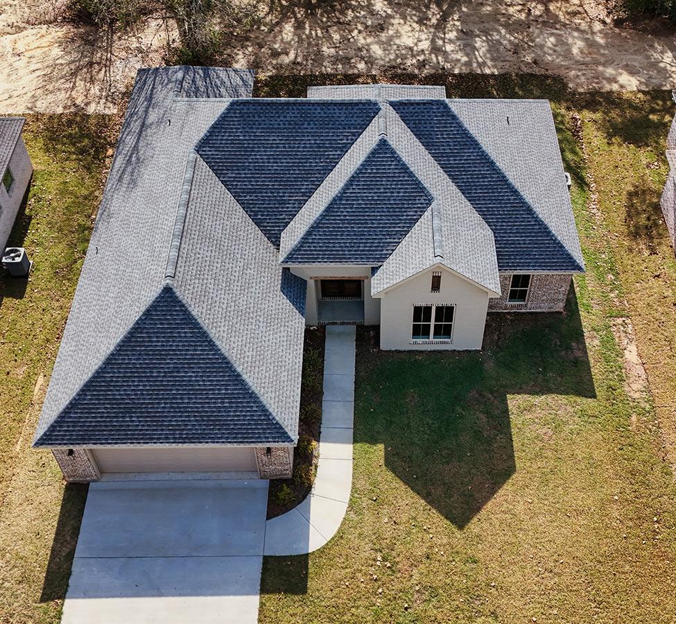 Aerial view of a custom home by a home builder in Pass Christian MS