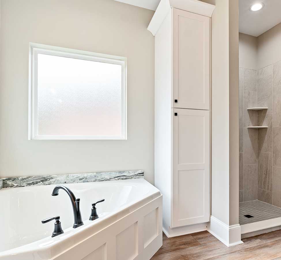 Bathroom with tub and walk-in shower from home remodeling in Pass Christian MS